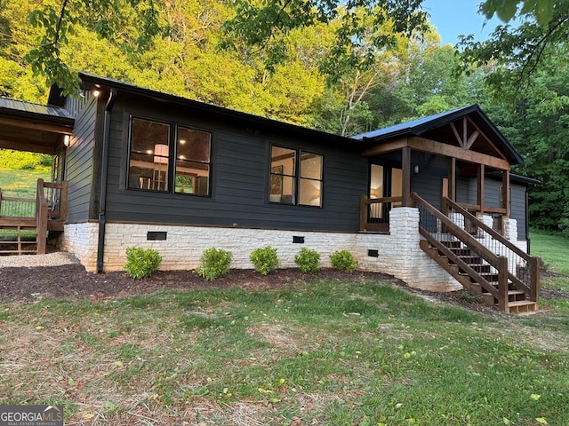 2380 Murphy Hwy, Mineral Bluff, GA 30559 - view of front of property with crawl space, stairway, and a front lawn