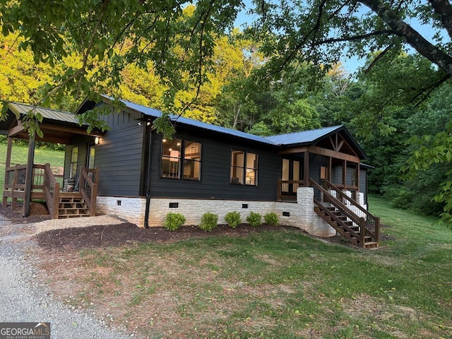 2380 Murphy Hwy, Mineral Bluff, GA 30559 - view of front of property with crawl space, a front lawn, metal roof, and a porch