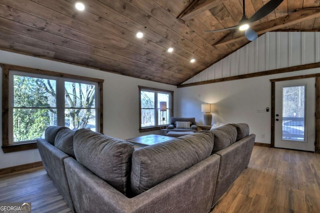 living area with recessed lighting, wood ceiling, baseboards, and wood finished floors