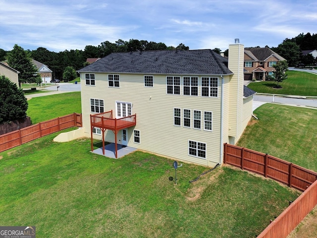 6793 Oconee Pl, Fairburn, GA 30213 - back of house featuring a chimney, a patio area, and a fenced backyard