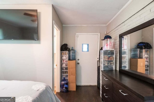 3614 Fairburn Pl NW, Atlanta, GA 30331 - bedroom with dark wood-style flooring and brick wall