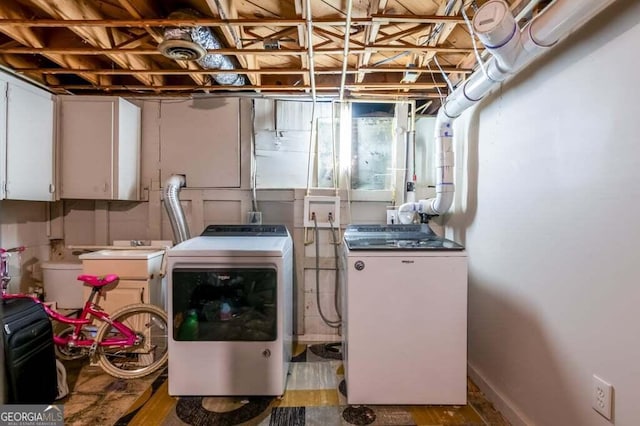 3614 Fairburn Pl NW, Atlanta, GA 30331 - washroom featuring cabinet space, visible vents, and washer and dryer