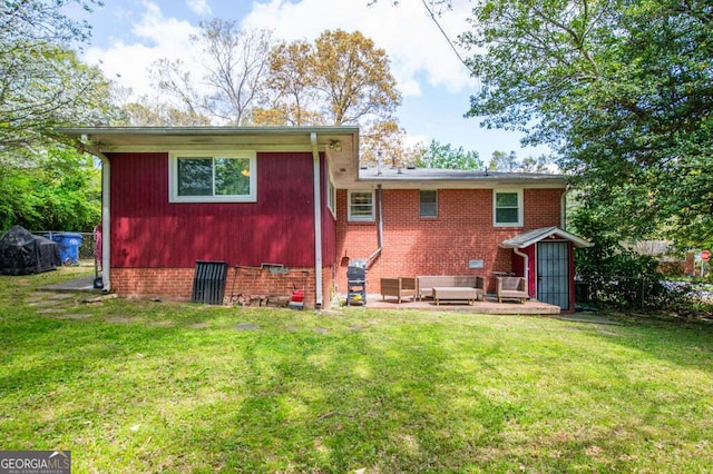 3614 Fairburn Pl NW, Atlanta, GA 30331 - back of house featuring brick siding, a yard, and a patio area