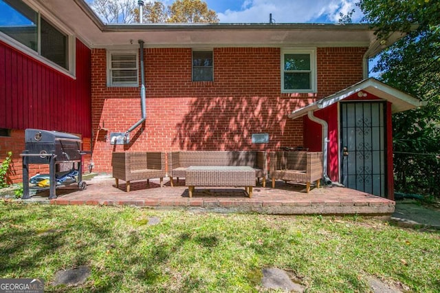 3614 Fairburn Pl NW, Atlanta, GA 30331 - back of property featuring brick siding, a yard, and a patio