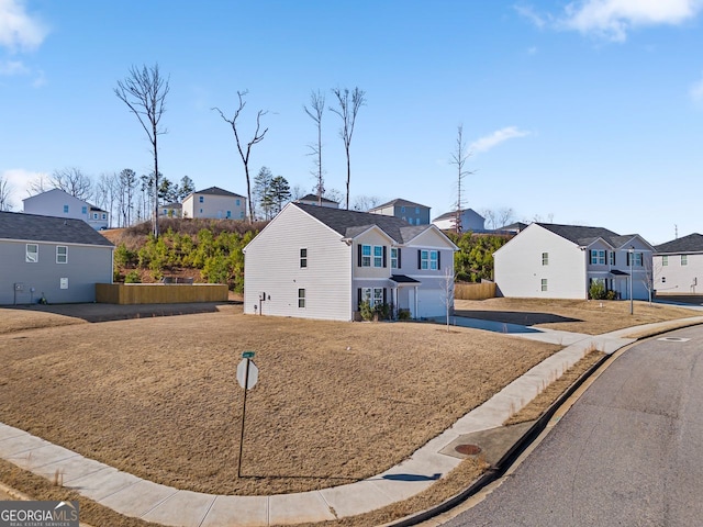 traditional-style home featuring a residential view