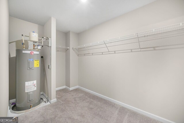 utility room with water heater
