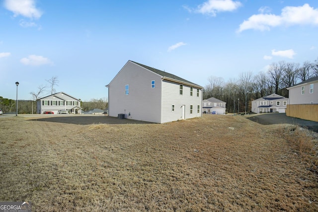 view of property exterior with central air condition unit