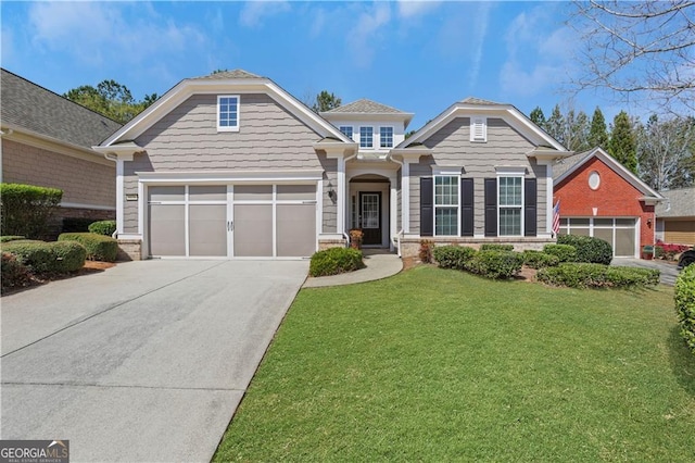 view of front of home with concrete driveway, brick siding, and a front yard