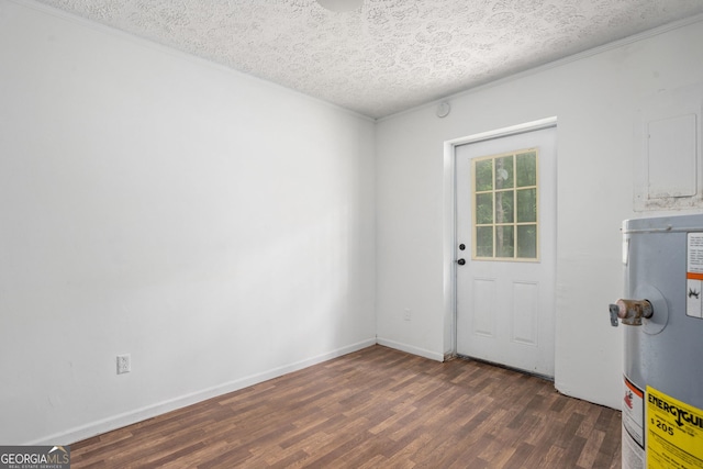 doorway with baseboards, wood finished floors, gas water heater, and a textured ceiling