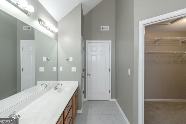 full bath with visible vents and a sink