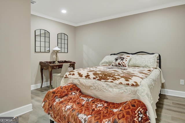 53 Gordon Manor Ct, Senoia, GA 30276 - bedroom with crown molding, wood finished floors, and recessed lighting