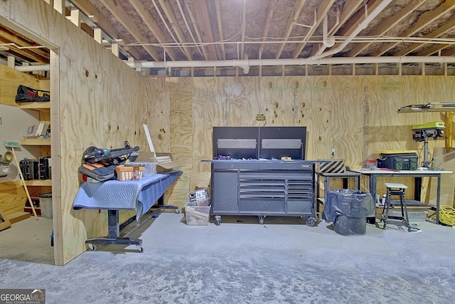 53 Gordon Manor Ct, Senoia, GA 30276 - miscellaneous room with concrete floors and a workshop area