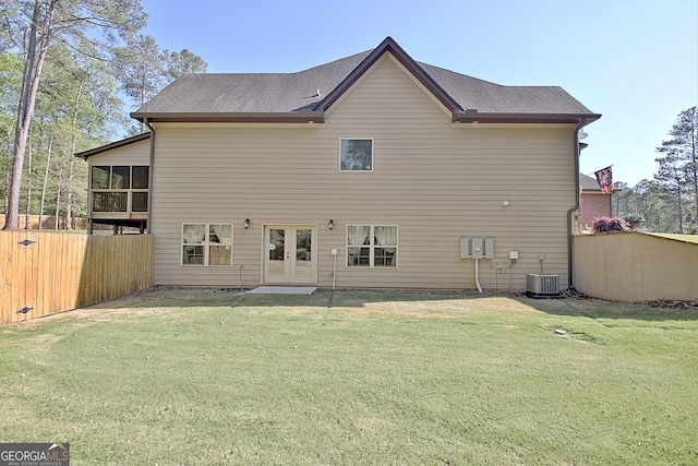 53 Gordon Manor Ct, Senoia, GA 30276 - rear view of house featuring french doors, a sunroom, and roof with shingles