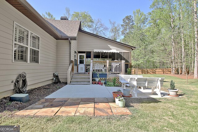 53 Gordon Manor Ct, Senoia, GA 30276 - rear view of house featuring a patio, a wooden deck, roof with shingles, and a chimney