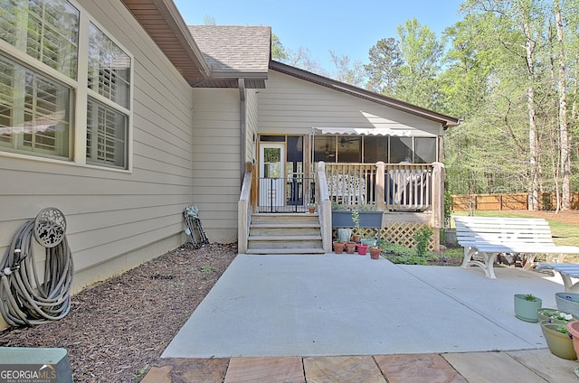 53 Gordon Manor Ct, Senoia, GA 30276 - doorway to property featuring a patio and a shingled roof