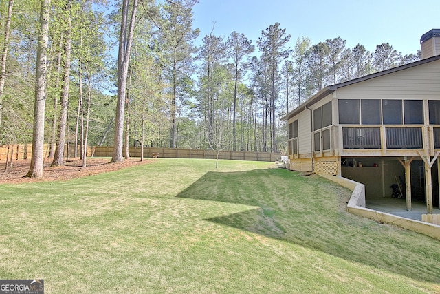 53 Gordon Manor Ct, Senoia, GA 30276 - fenced yard featuring a sunroom