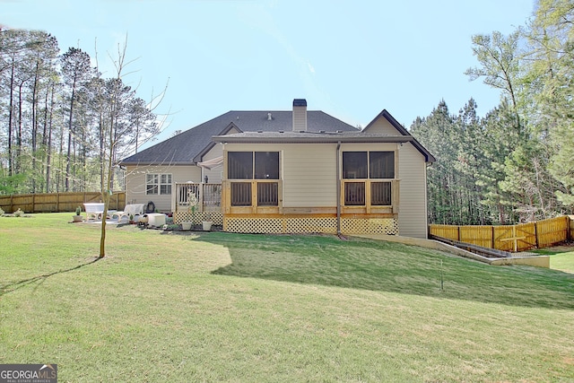 53 Gordon Manor Ct, Senoia, GA 30276 - back of property featuring a sunroom and a chimney