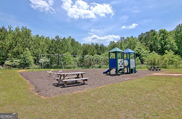 53 Gordon Manor Ct, Senoia, GA 30276 - community jungle gym featuring a yard and a view of trees