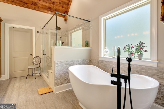 53 Gordon Manor Ct, Senoia, GA 30276 - bathroom with a stall shower, wood finished floors, a freestanding bath, and wood ceiling