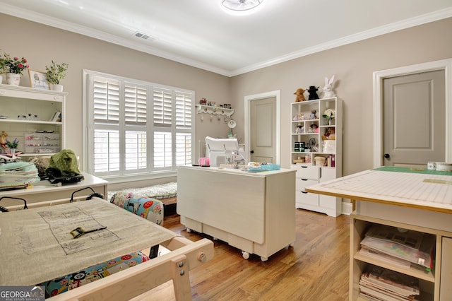 53 Gordon Manor Ct, Senoia, GA 30276 - home office featuring crown molding and light wood-type flooring