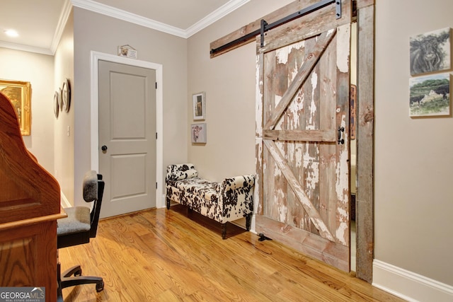 53 Gordon Manor Ct, Senoia, GA 30276 - entrance foyer with a barn door, wood finished floors, and crown molding