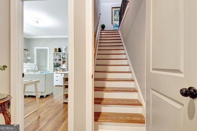 53 Gordon Manor Ct, Senoia, GA 30276 - stairs featuring crown molding and wood finished floors