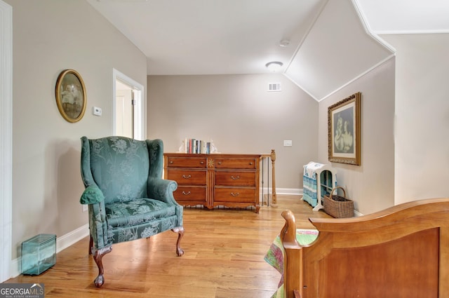 53 Gordon Manor Ct, Senoia, GA 30276 - sitting room featuring light wood finished floors and lofted ceiling