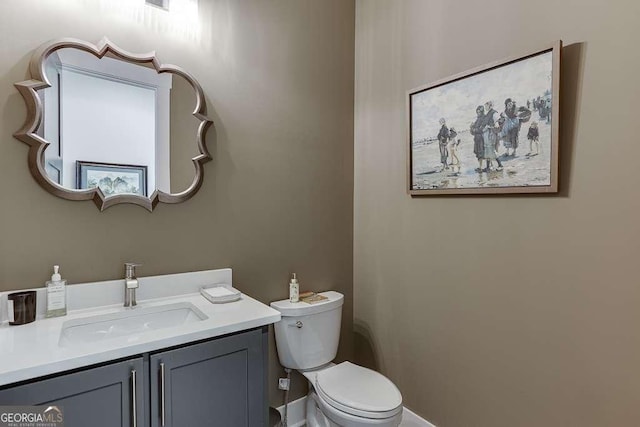 6014 Warpath Rd, Flowery Branch, GA 30542 - bathroom featuring vanity and toilet