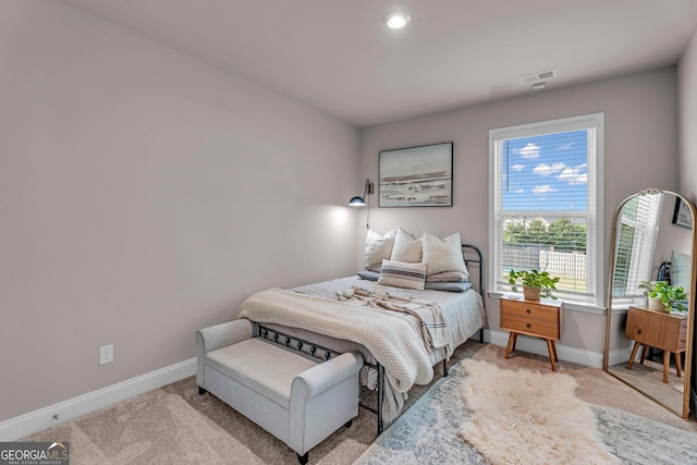 bedroom with baseboards, visible vents, carpet floors, and recessed lighting