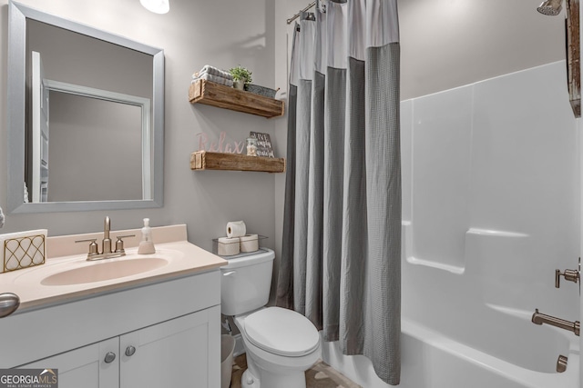 full bath featuring shower / tub combo, toilet, and vanity