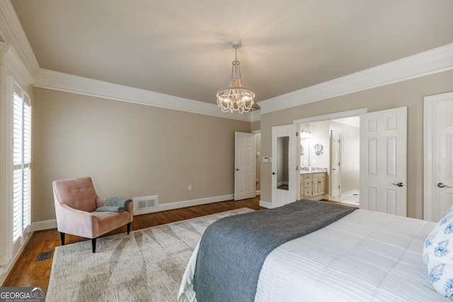 bedroom featuring wood finished floors, an inviting chandelier, ornamental molding, baseboards, and visible vents