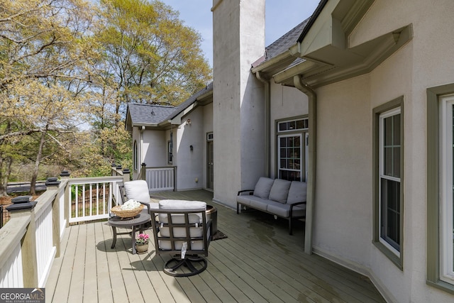 deck with an outdoor living space