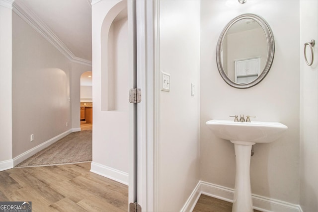 2036 Broadmoor Way, Fairburn, GA 30213 - bathroom with baseboards, ornamental molding, and wood finished floors
