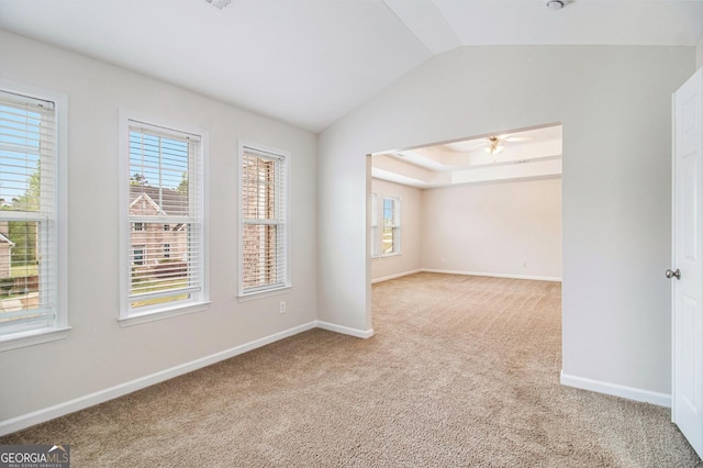 2036 Broadmoor Way, Fairburn, GA 30213 - unfurnished room featuring a raised ceiling, lofted ceiling, baseboards, light colored carpet, and ceiling fan