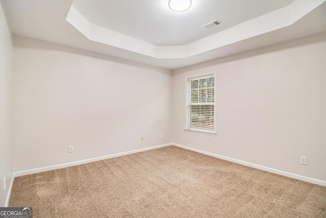 2036 Broadmoor Way, Fairburn, GA 30213 - carpeted empty room featuring baseboards, a tray ceiling, and visible vents