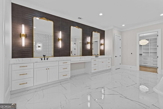 bathroom with marble finish floor, ornamental molding, and visible vents