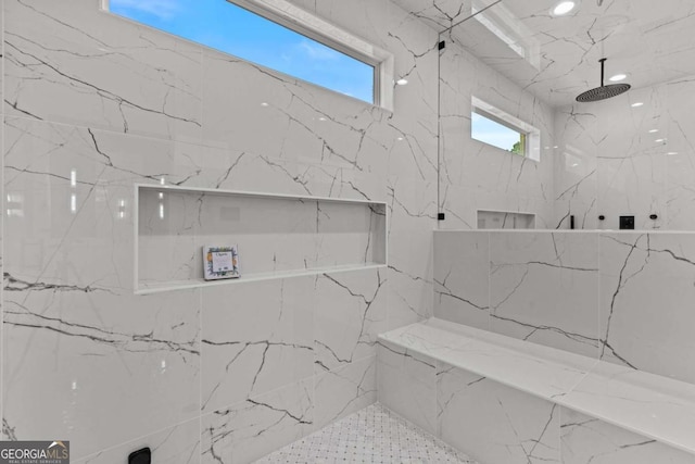 bathroom with recessed lighting and a marble finish shower
