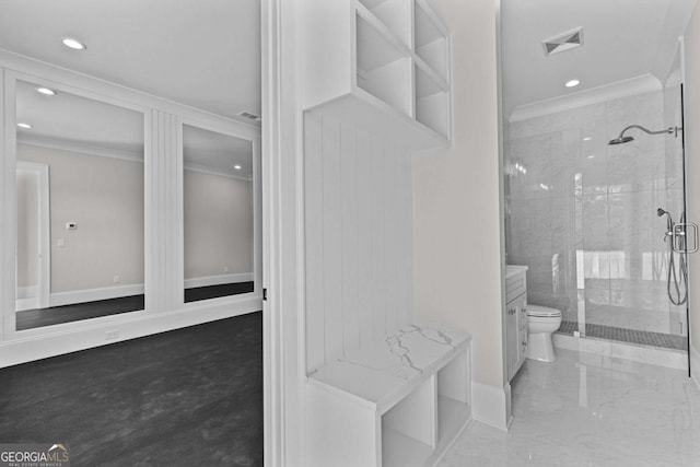 bathroom featuring a shower stall, visible vents, and crown molding