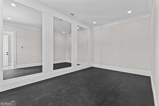 spare room featuring baseboards, visible vents, recessed lighting, and ornamental molding