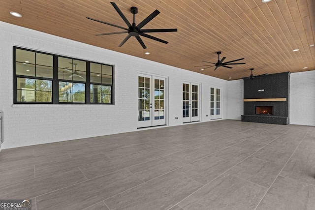 view of patio / terrace with french doors and ceiling fan