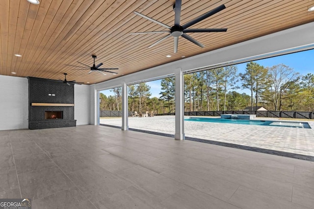 view of patio / terrace with a fenced in pool and fence