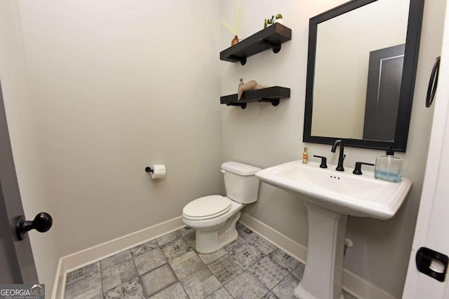 1494 Addison Pl, Decatur, GA 30033 - bathroom with baseboards and toilet