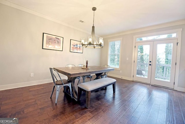 1494 Addison Pl, Decatur, GA 30033 - dining room featuring a chandelier, baseboards, ornamental molding, and dark wood-style floors