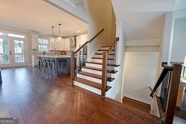 1494 Addison Pl, Decatur, GA 30033 - stairs featuring wood-type flooring, french doors, baseboards, and recessed lighting