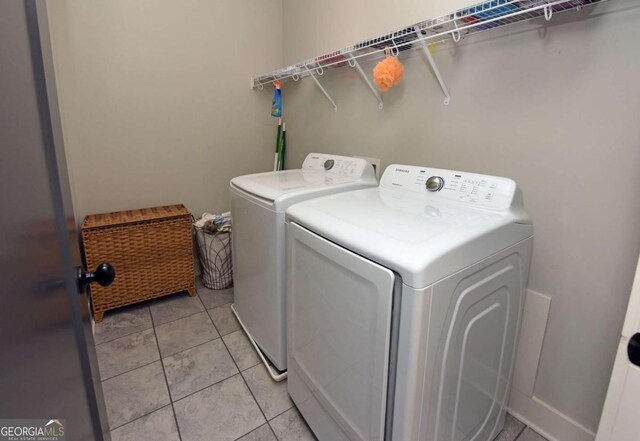 1494 Addison Pl, Decatur, GA 30033 - clothes washing area featuring separate washer and dryer and light tile patterned floors