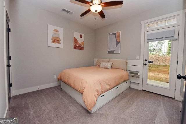 1494 Addison Pl, Decatur, GA 30033 - bedroom featuring access to exterior, carpet floors, baseboards, and a ceiling fan