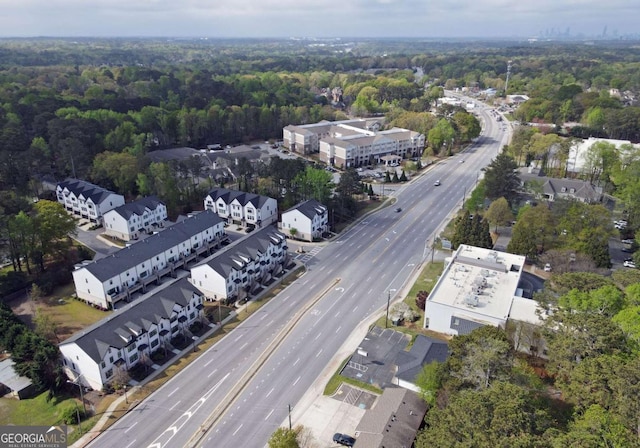 1494 Addison Pl, Decatur, GA 30033 - aerial overview of property's location featuring a main thoroughfare and a heavily wooded area