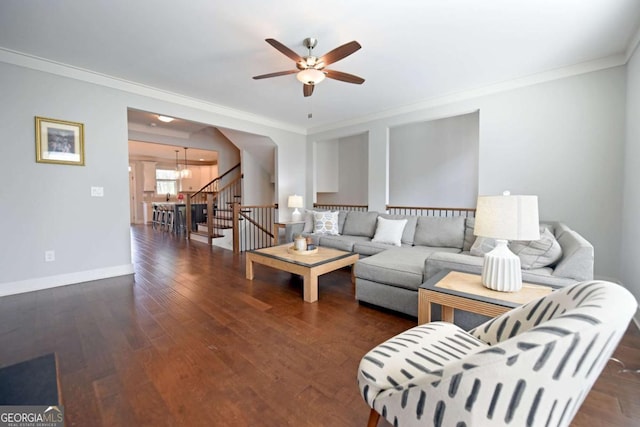 1494 Addison Pl, Decatur, GA 30033 - living room with ornamental molding, a ceiling fan, wood finished floors, baseboards, and stairs