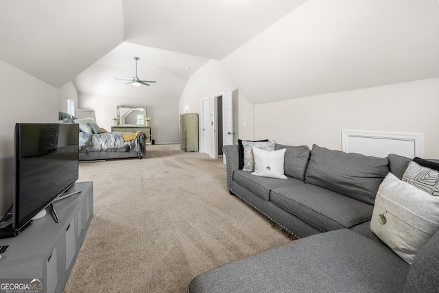 interior space with lofted ceiling, baseboards, and ceiling fan
