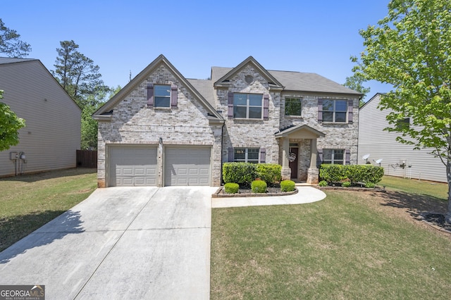 view of front of home featuring concrete driveway, a front lawn, stone siding, a garage, and brick siding